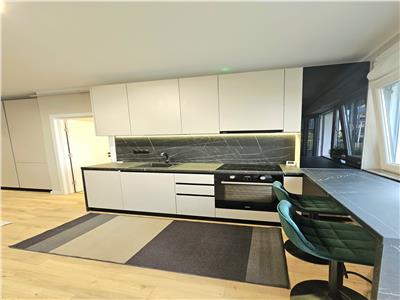Apartament cu 2 camere si gradina la cheie nou mobilat si utilat.