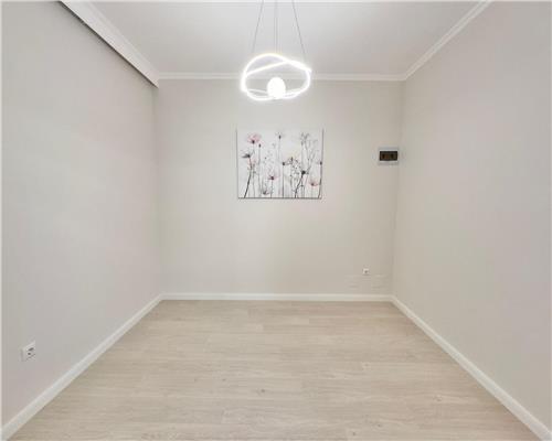 Apartament cu 3 camere, finisaje si mobilier premium 56 mp plus terasa 12 mp etaj intermediar in Floresti!