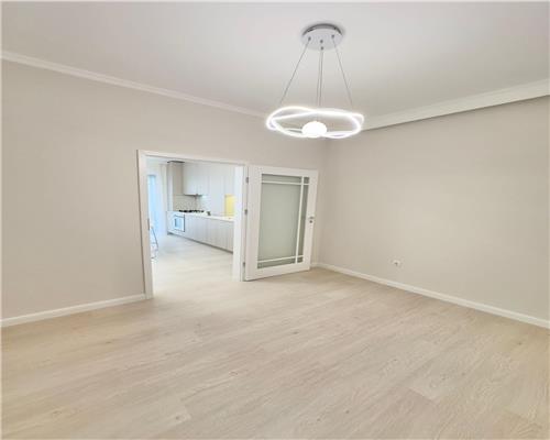 Apartament cu 3 camere, finisaje si mobilier premium 56 mp plus terasa 12 mp etaj intermediar in Floresti!