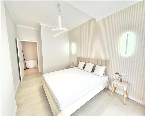 Apartament cu 3 camere, finisaje si mobilier premium 56 mp plus terasa 12 mp etaj intermediar in Floresti!