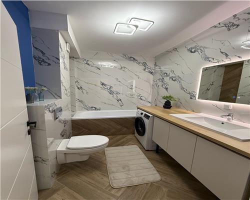 Apartament la cheie lux, living si bucatarie, 2 dormitoare, dressing si gradina 10 mp.