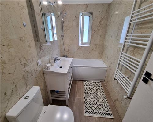 Apartament mobilat si utilat la cheie, decomandat, 2 dormitoare, parter inalt in Floresti.