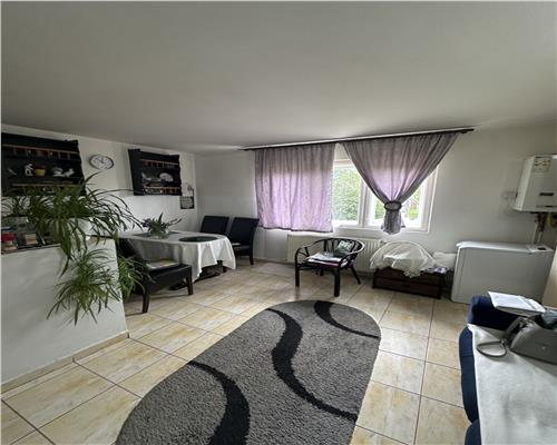 Casa indviduala cu 3 camere, living, bucatarie, 2 bai si mansarda in apropiere de Gherla!