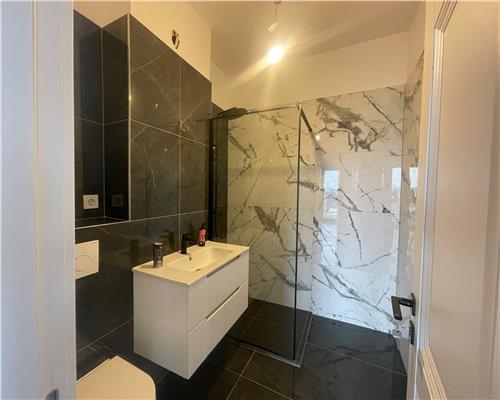 Apartament superb, 59 mp utili + terasă 20 mp | Zona BMW | Garaj subteran.