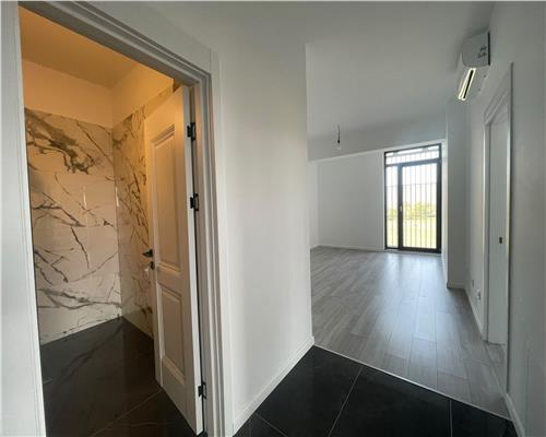 Apartament superb, 59 mp utili + terasă 20 mp | Zona BMW | Garaj subteran.
