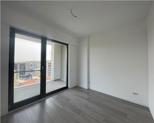 Apartament superb, 59 mp utili + terasă 20 mp | Zona BMW | Garaj subteran.