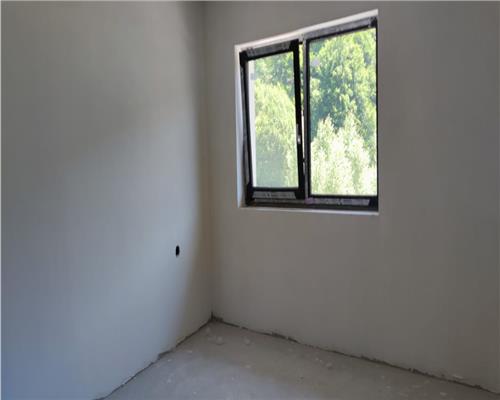 Duplex semifinisat 4 camere suprafata de 120 mp utili + 200 mp teren liber.