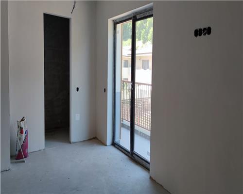 Duplex semifinisat 4 camere suprafata de 120 mp utili + 200 mp teren liber.