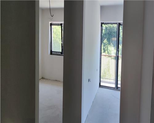 Duplex semifinisat 4 camere suprafata de 120 mp utili + 200 mp teren liber.
